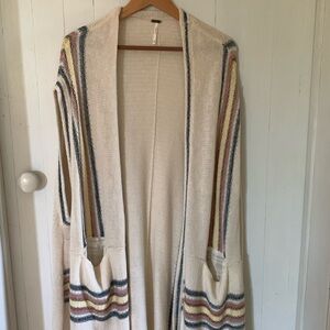 Free People colorful striped open front sleeveless cardigan.